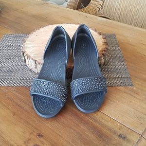 Crocs open to flats